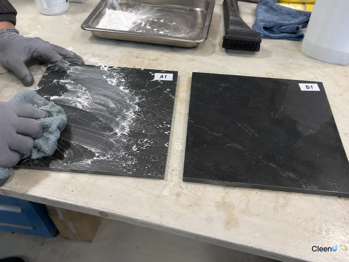 AI illustration: Two dark tile samples, one with white dust and wipe marks and the other more evenly colored